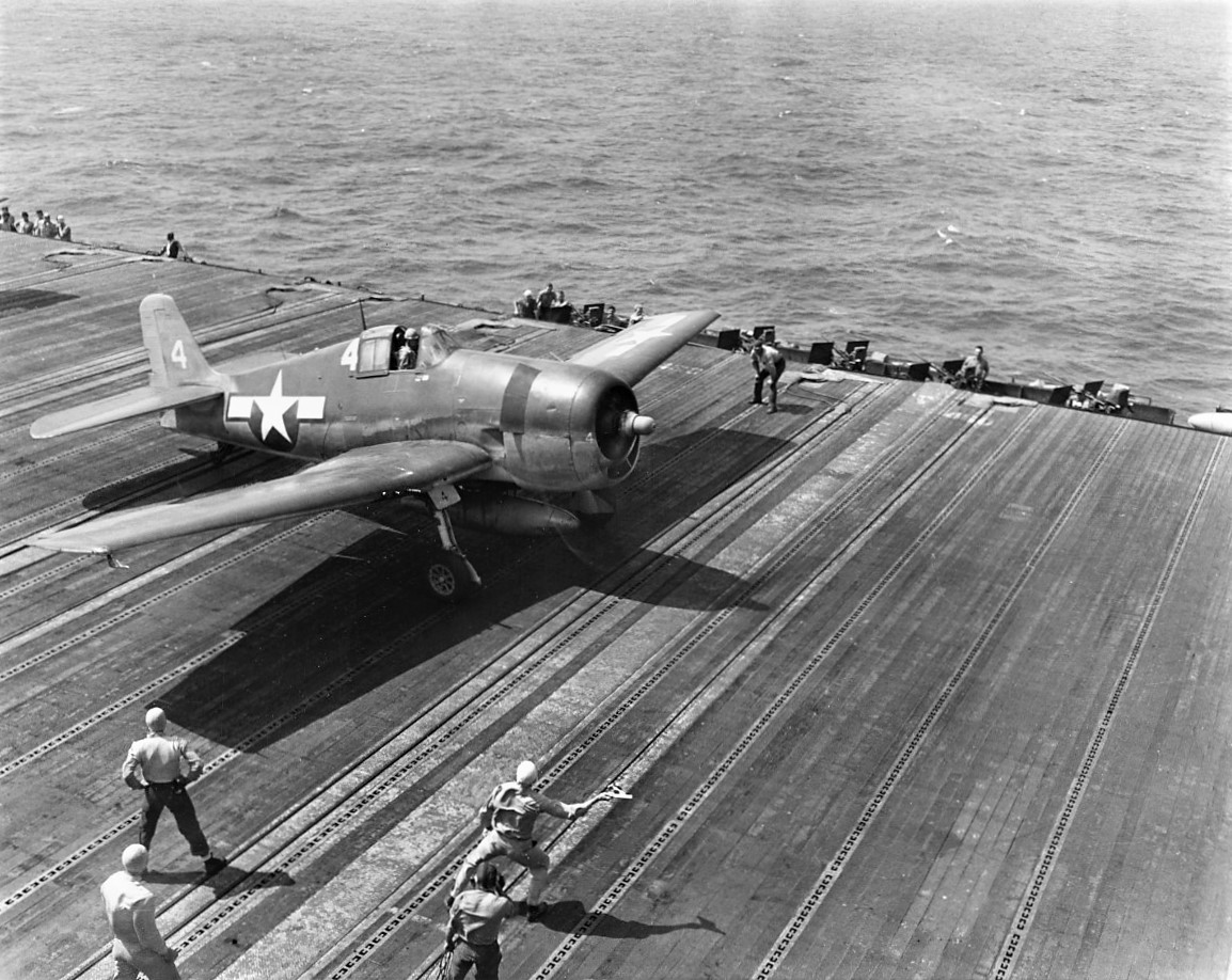 USS Lexington CV 16 launching a Grumman F6F Hellcat circa 12 October 1944 80 G 285037